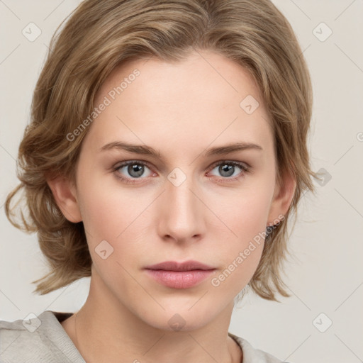 Neutral white young-adult female with medium  brown hair and grey eyes