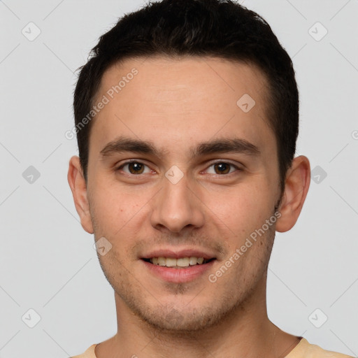 Joyful white young-adult male with short  brown hair and brown eyes