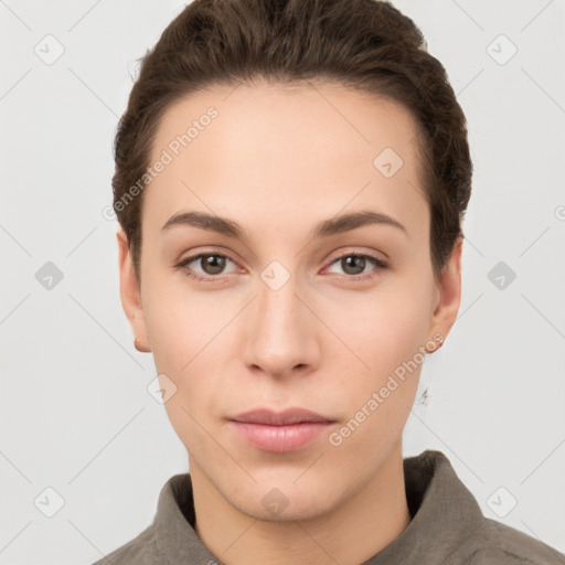 Neutral white young-adult female with short  brown hair and brown eyes