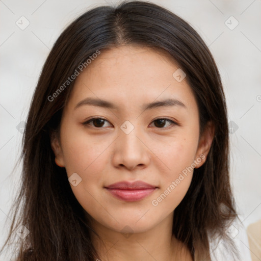 Joyful asian young-adult female with long  brown hair and brown eyes