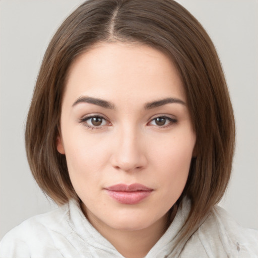 Neutral white young-adult female with medium  brown hair and brown eyes