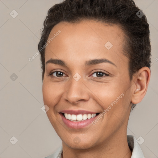 Joyful white young-adult female with short  brown hair and brown eyes