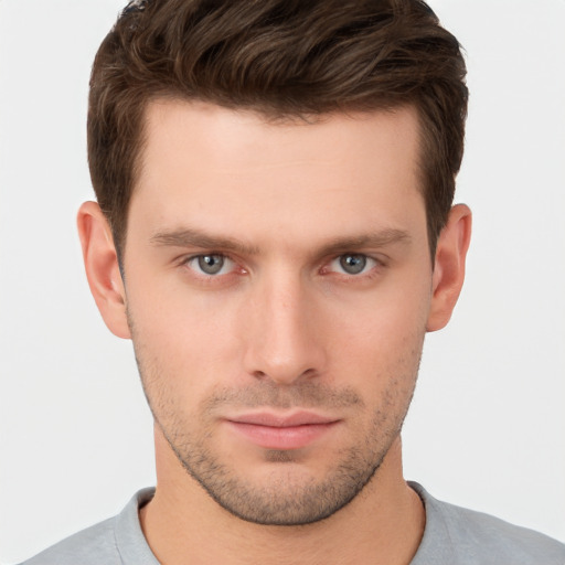 Neutral white young-adult male with short  brown hair and brown eyes