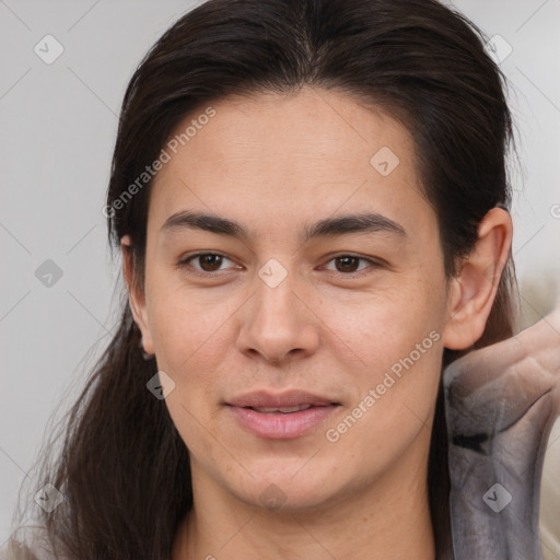 Joyful white young-adult female with medium  brown hair and brown eyes