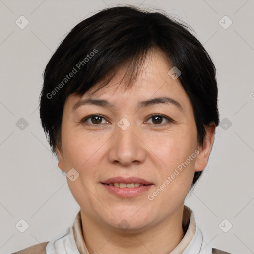 Joyful white adult female with medium  brown hair and brown eyes