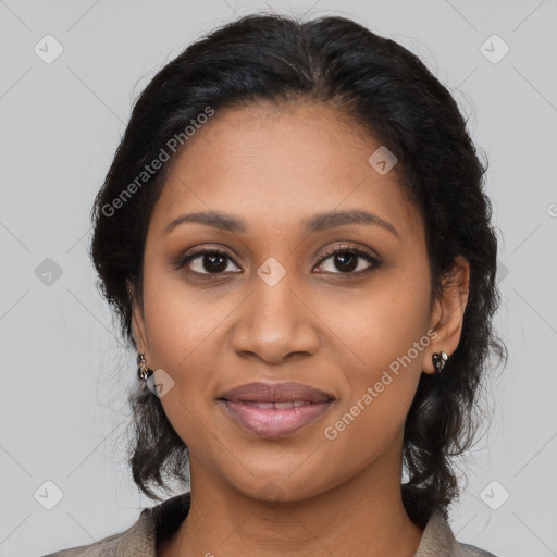 Joyful black young-adult female with medium  brown hair and brown eyes