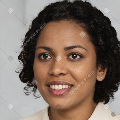 Joyful black young-adult female with medium  black hair and brown eyes