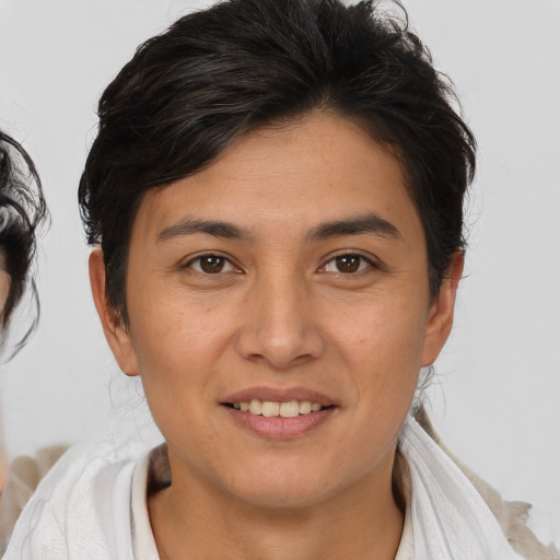 Joyful white young-adult female with medium  brown hair and brown eyes