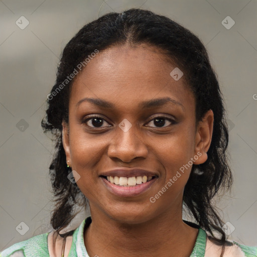 Joyful black young-adult female with medium  brown hair and brown eyes