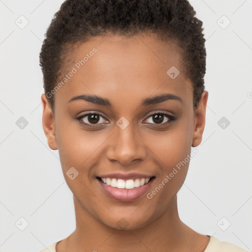 Joyful black young-adult female with short  brown hair and brown eyes