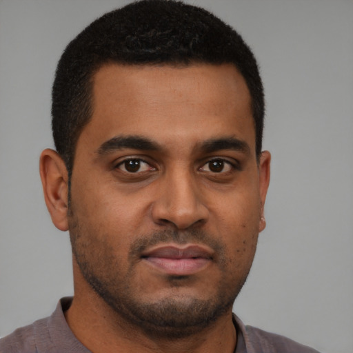 Neutral black young-adult male with short  brown hair and brown eyes