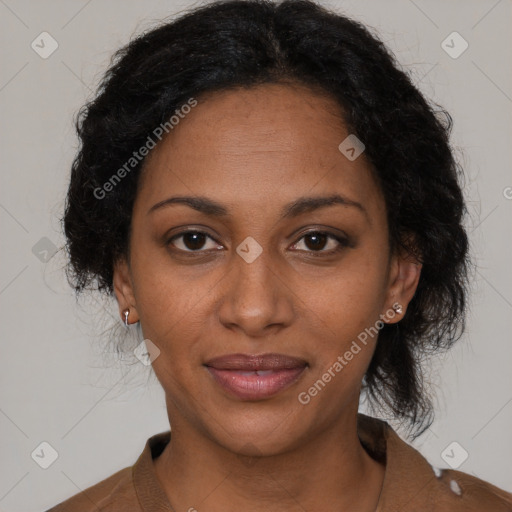 Joyful black adult female with medium  black hair and brown eyes