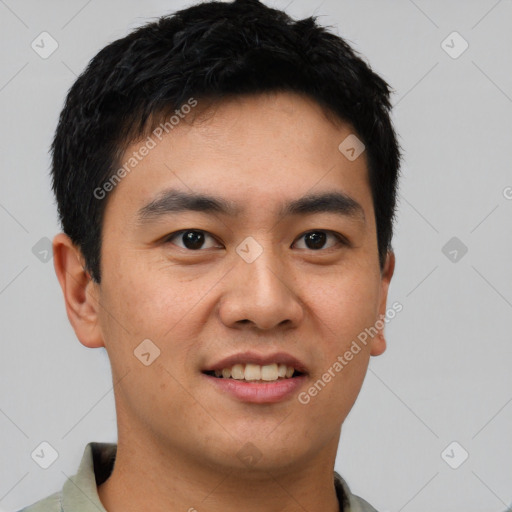 Joyful white young-adult male with short  black hair and brown eyes