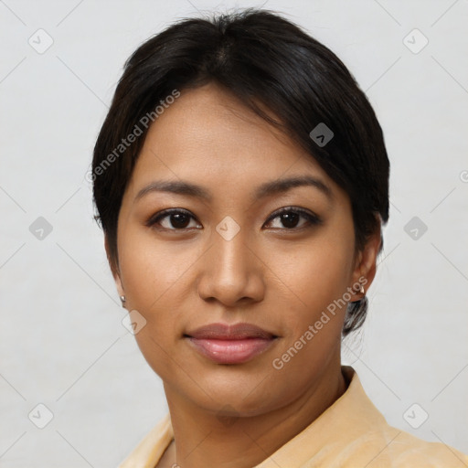 Joyful asian young-adult female with short  brown hair and brown eyes