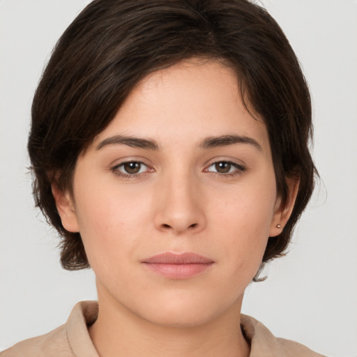 Neutral white young-adult female with medium  brown hair and brown eyes