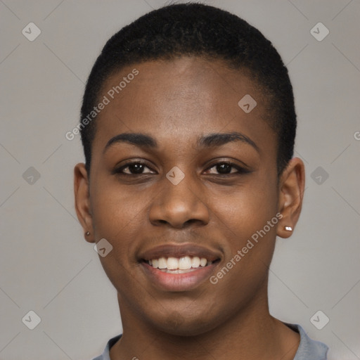 Joyful black young-adult female with short  black hair and brown eyes