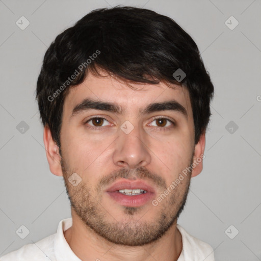 Neutral white young-adult male with short  brown hair and brown eyes