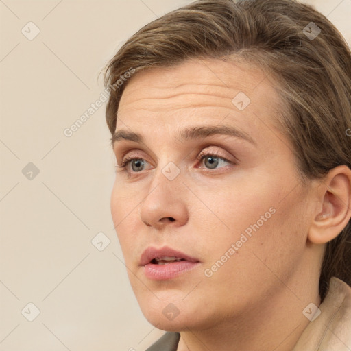 Neutral white young-adult female with short  brown hair and brown eyes