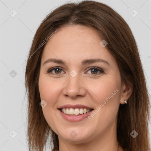 Joyful white young-adult female with long  brown hair and grey eyes