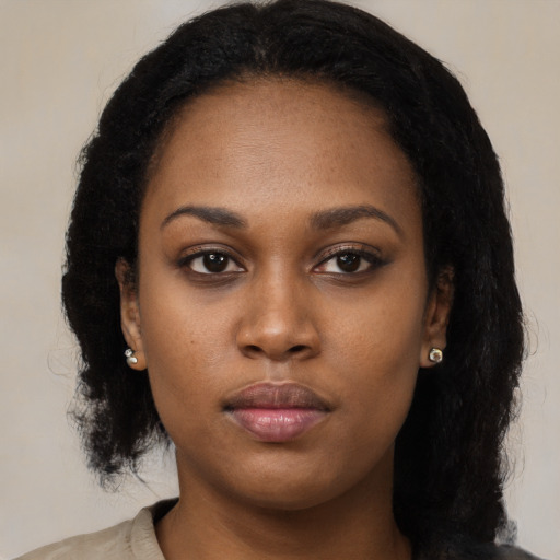 Neutral black young-adult female with long  black hair and brown eyes
