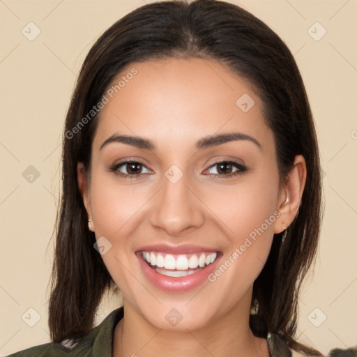 Joyful white young-adult female with long  brown hair and brown eyes