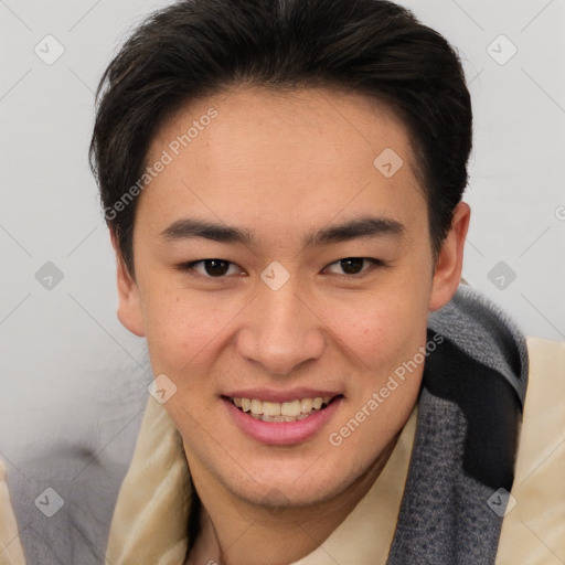 Joyful asian young-adult male with short  brown hair and brown eyes