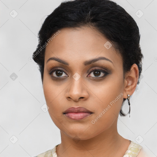 Joyful latino young-adult female with long  brown hair and brown eyes