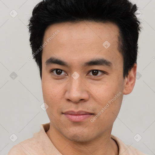 Joyful asian young-adult male with short  black hair and brown eyes