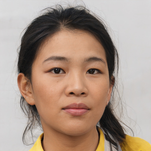 Neutral asian young-adult female with medium  brown hair and brown eyes