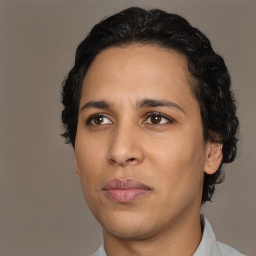 Neutral latino young-adult male with medium  black hair and brown eyes