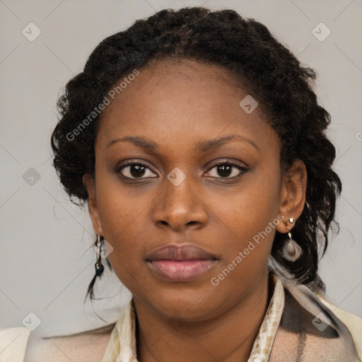Neutral black young-adult female with medium  brown hair and brown eyes