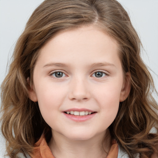 Joyful white child female with long  brown hair and grey eyes