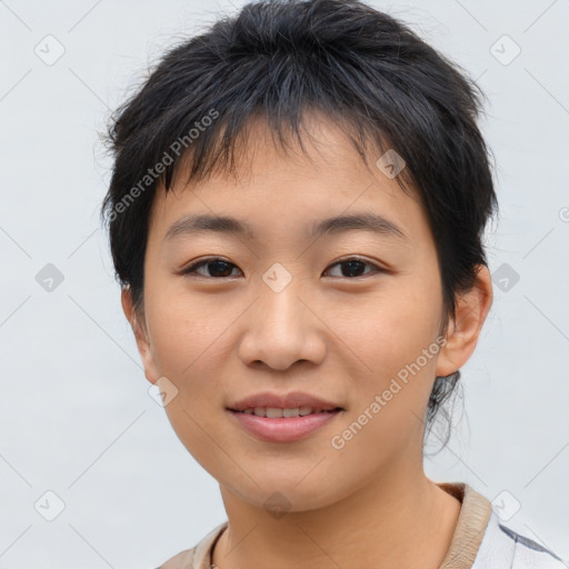 Joyful asian young-adult female with short  brown hair and brown eyes