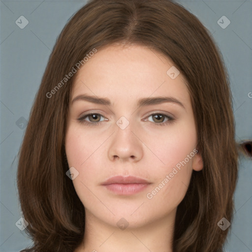 Neutral white young-adult female with long  brown hair and brown eyes