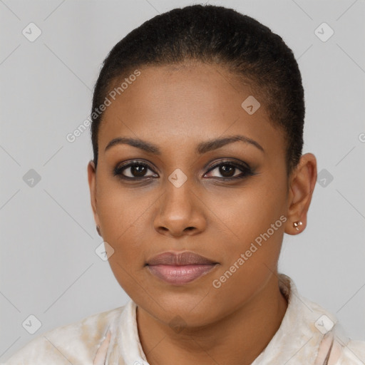 Joyful black young-adult female with short  brown hair and brown eyes