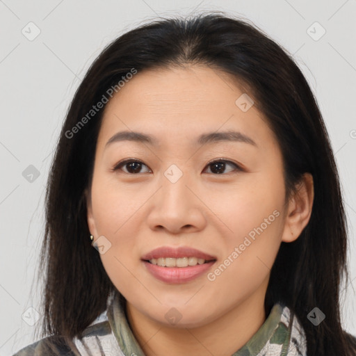 Joyful asian young-adult female with medium  brown hair and brown eyes