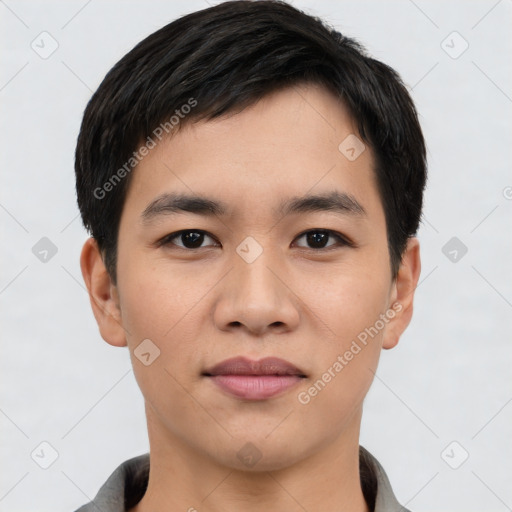 Joyful asian young-adult male with short  black hair and brown eyes