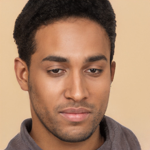 Neutral black young-adult male with short  brown hair and brown eyes