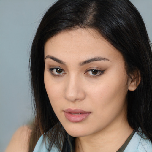 Neutral asian young-adult female with medium  brown hair and brown eyes