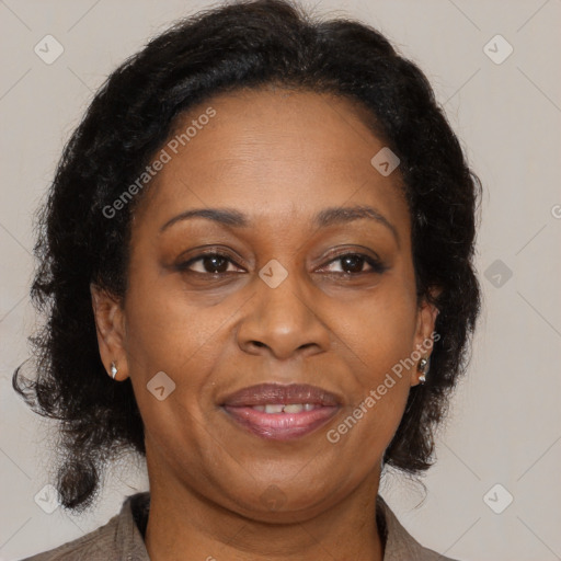 Joyful black adult female with medium  brown hair and brown eyes