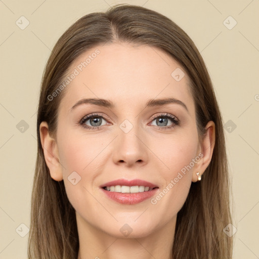 Joyful white young-adult female with long  brown hair and grey eyes