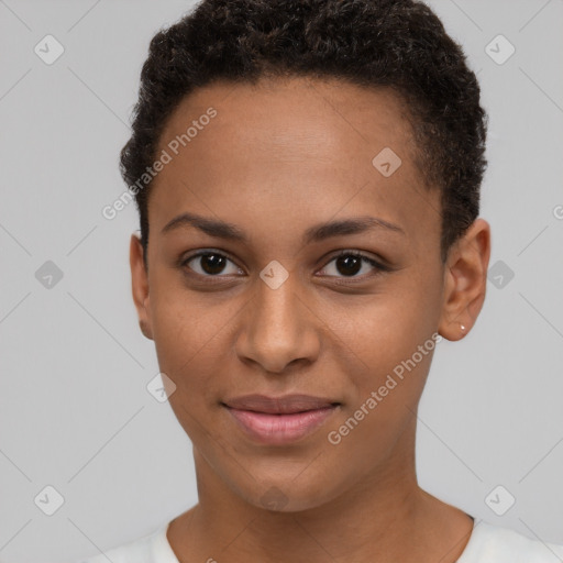 Joyful black young-adult female with short  brown hair and brown eyes