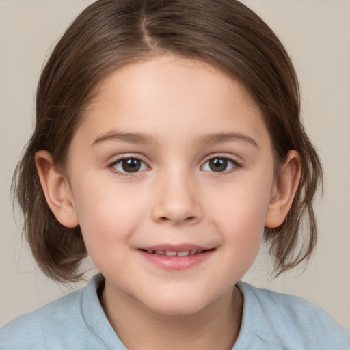 Joyful white child female with medium  brown hair and brown eyes