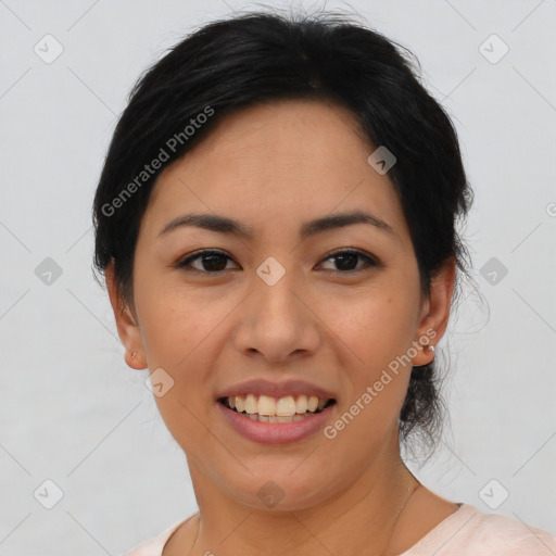 Joyful asian young-adult female with medium  black hair and brown eyes