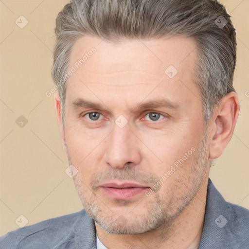 Neutral white adult male with short  brown hair and brown eyes