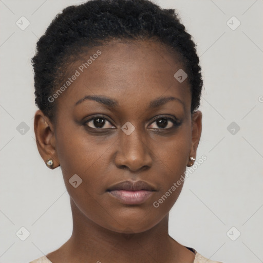 Neutral black young-adult female with short  brown hair and brown eyes