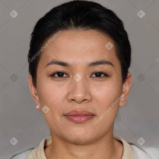 Joyful asian young-adult female with short  black hair and brown eyes