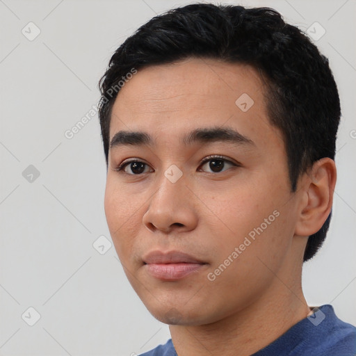 Neutral asian young-adult male with short  black hair and brown eyes