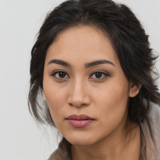 Neutral latino young-adult female with long  brown hair and brown eyes
