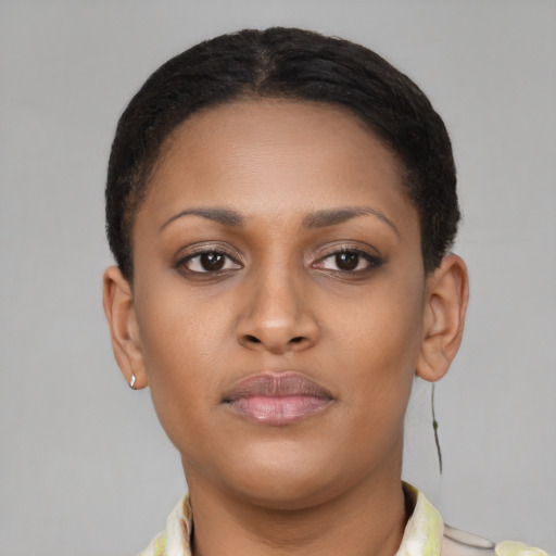 Neutral black young-adult female with short  brown hair and brown eyes